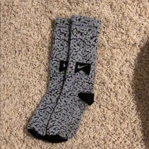 Patterned Nike socks.